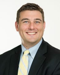 Headshot of attorney Christopher M. Emrich